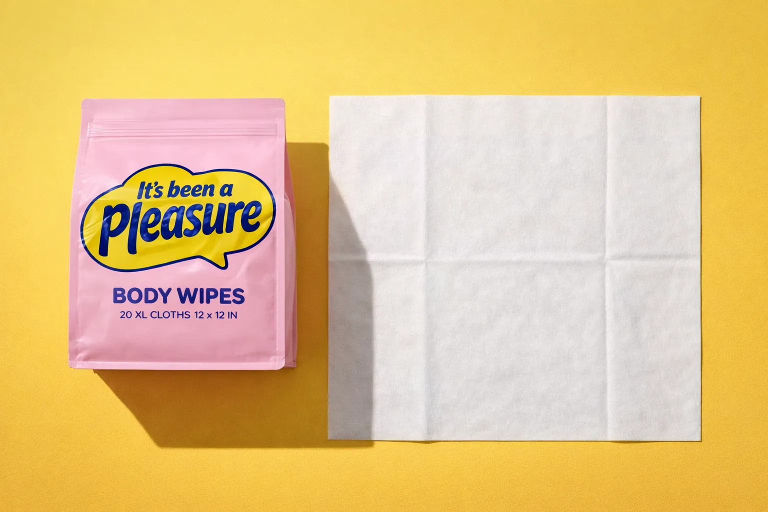 One extra-large cloth laid flat next to the pink pouch.